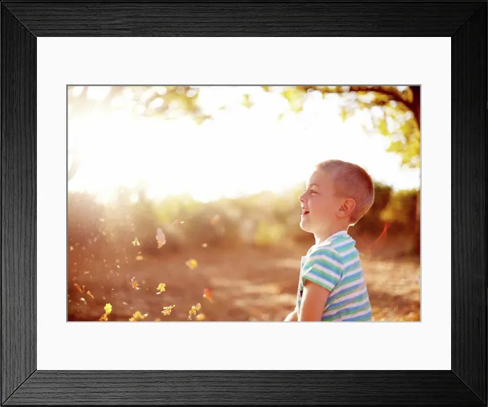 Framed Print : Throwing leaves, profile and boy in park Framed Print : Throwing leaves, profile and boy in park