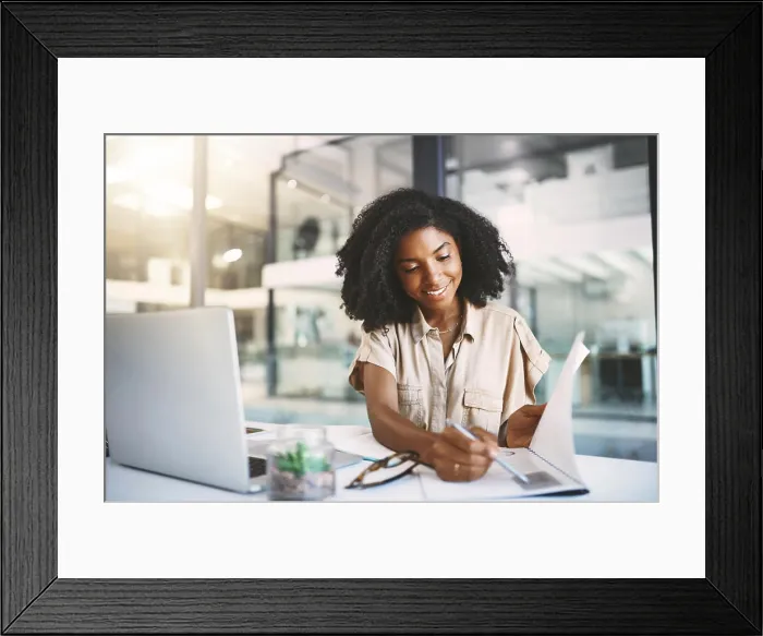Framed Print : African woman, documents and reading in office with smile Framed Print : African woman, documents and reading in office with smile