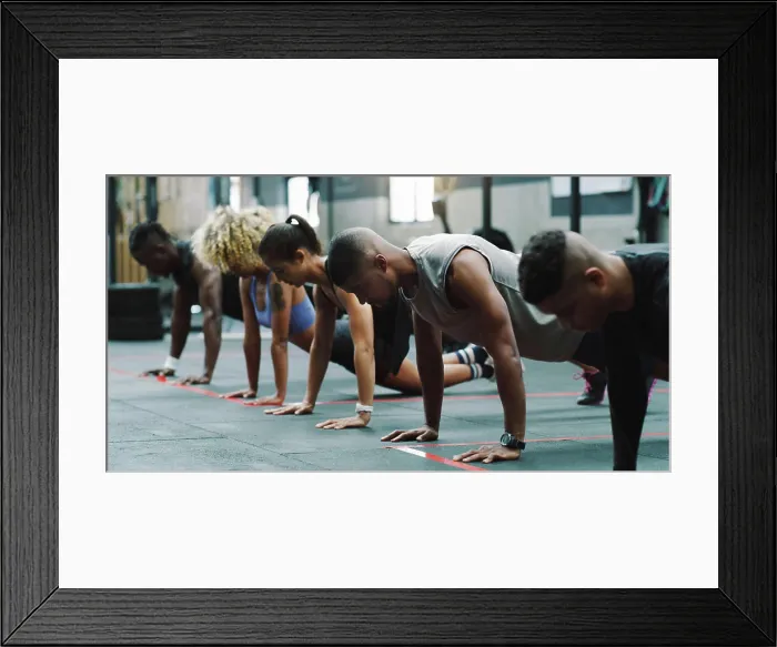 Framed Print : Teamwork, fitness and people do push up in gym for training Framed Print : Teamwork, fitness and people do push up in gym for training