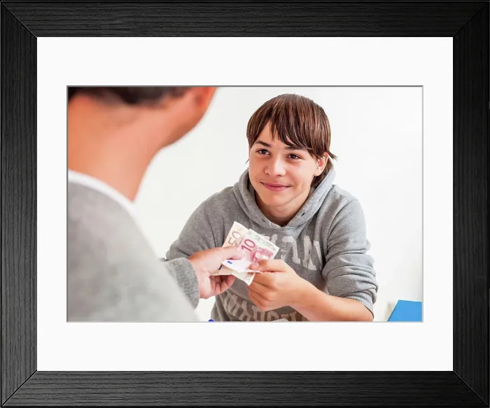 Framed Print : Teenager, Father giving pocket money to his son