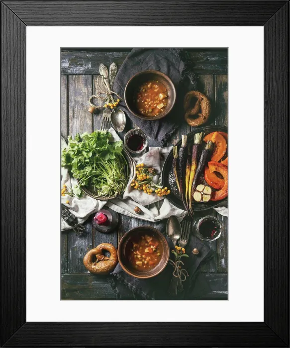 Framed Print : Fall holiday table decoration setting with bowls of hot carrot potato soup