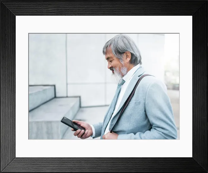 Framed Print : Japanese businessman, city travel or phone for company management schedule Framed Print : Japanese businessman, city travel or phone for company management schedule