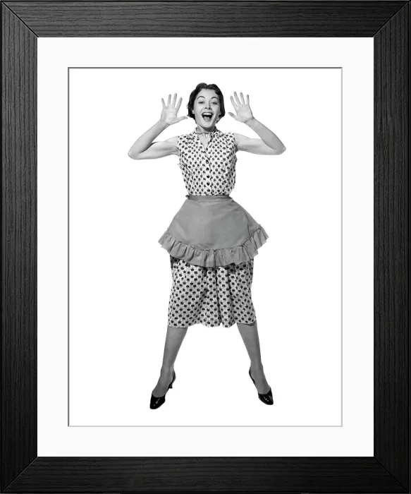 Framed Print : 1950S Woman In Apron Jumping Exaggerated Expression Framed Print : 1950S Woman In Apron Jumping Exaggerated Expression