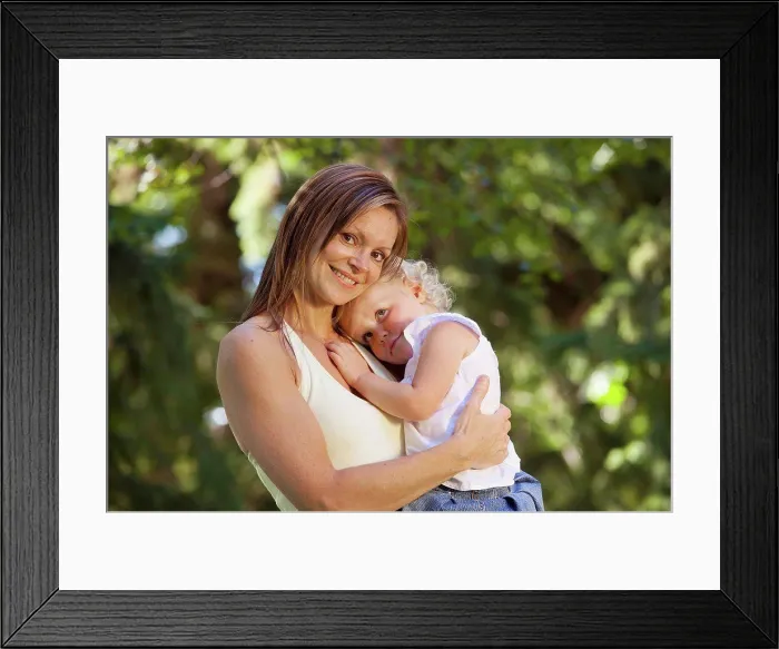 Framed Print : mother holding toddler in a park, edmonton alberta canada Framed Print : mother holding toddler in a park, edmonton alberta canada
