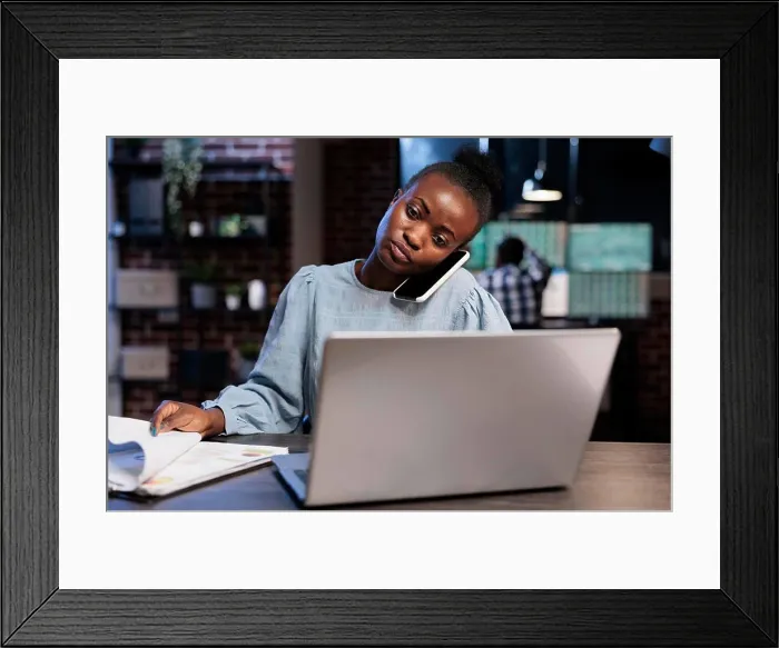 Framed Print : Trading company professional agent talking on phone with client while explaining to him what is Forex Framed Print : Trading company professional agent talking on phone with client while explaining to him what is Forex