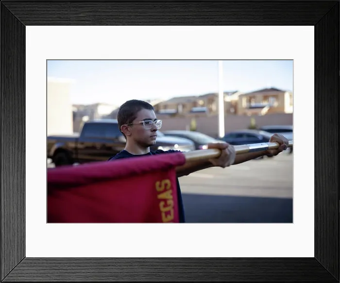 Framed Print : A poolee with Recruiting Substation North Las Vegas holds out a guidon before conducting physical training at a pool Framed Print : A poolee with Recruiting Substation North Las Vegas holds out a guidon before conducting physical training at a pool
