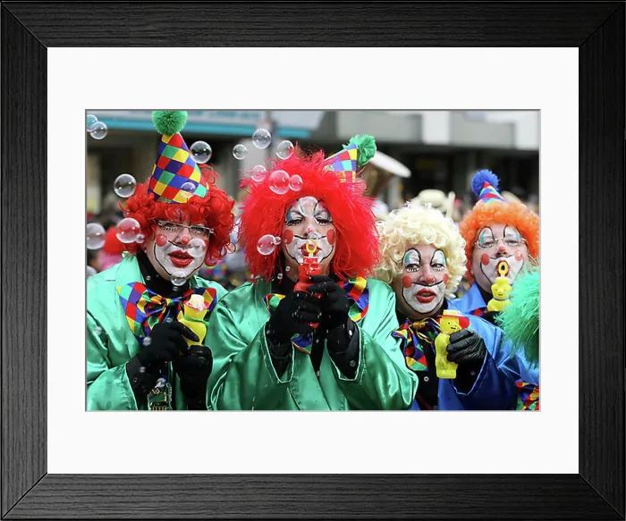 Framed Print : Mardi gras parade in Koblenz, Rhineland-Palatinate, Germany: clowns making soap-bubbles Framed Print : Mardi gras parade in Koblenz, Rhineland-Palatinate, Germany: clowns making soap-bubbles