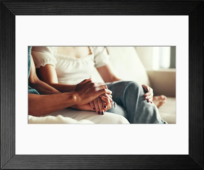 Framed Print : Couple, support and holding hands on sofa with love Framed Print : Couple, support and holding hands on sofa with love