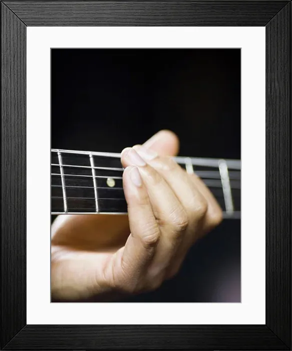 Framed Print : man playing a guitar