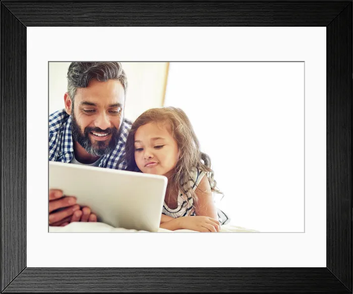 Framed Print : Father, child and tablet in family home for online games Framed Print : Father, child and tablet in family home for online games