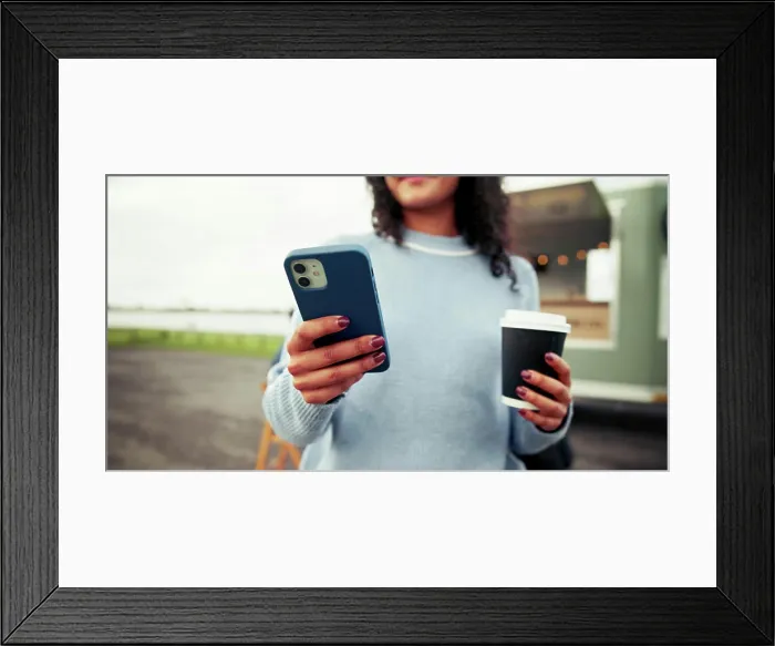 Framed Print : Woman, hands and phone with coffee for review Framed Print : Woman, hands and phone with coffee for review