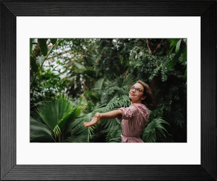 Framed Print : Beautiful woman standing in botanical garden Framed Print : Beautiful woman standing in botanical garden