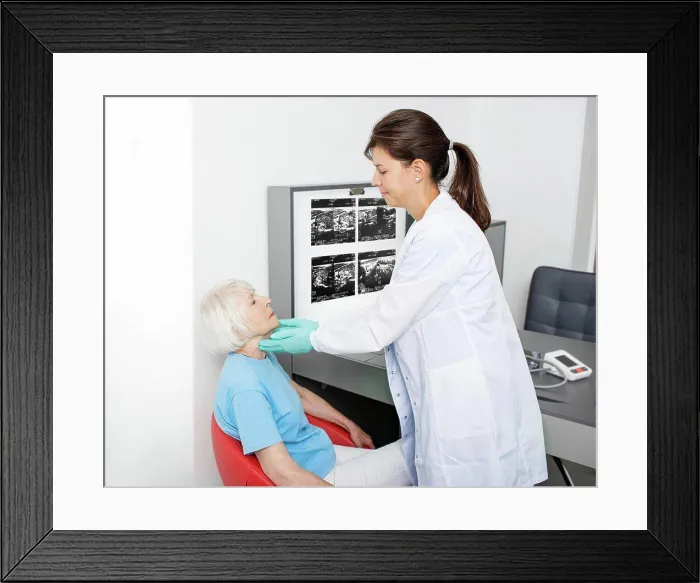 Framed Print : Throat examination Framed Print : Throat examination