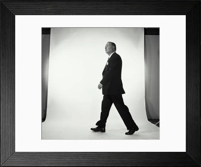 Framed Print : Side profile of businessman walking