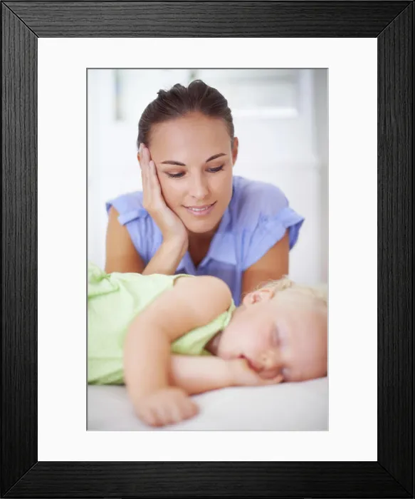 Framed Print : Sweet, sleeping and mother with baby on bed for bonding Framed Print : Sweet, sleeping and mother with baby on bed for bonding