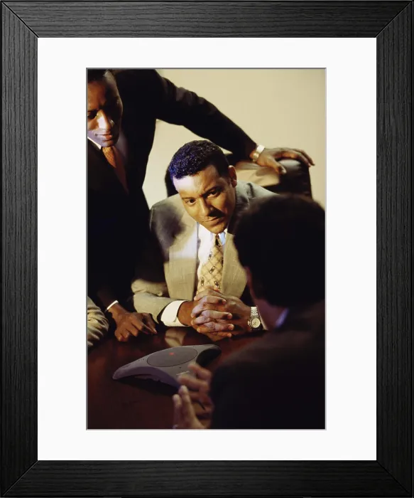 Framed Print : High angle view of three businessmen in an office Framed Print : High angle view of three businessmen in an office