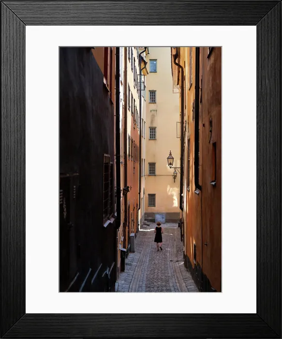 Framed Print : Woman in the narrow alleys of Gamla Stan in Stockholm Framed Print : Woman in the narrow alleys of Gamla Stan in Stockholm
