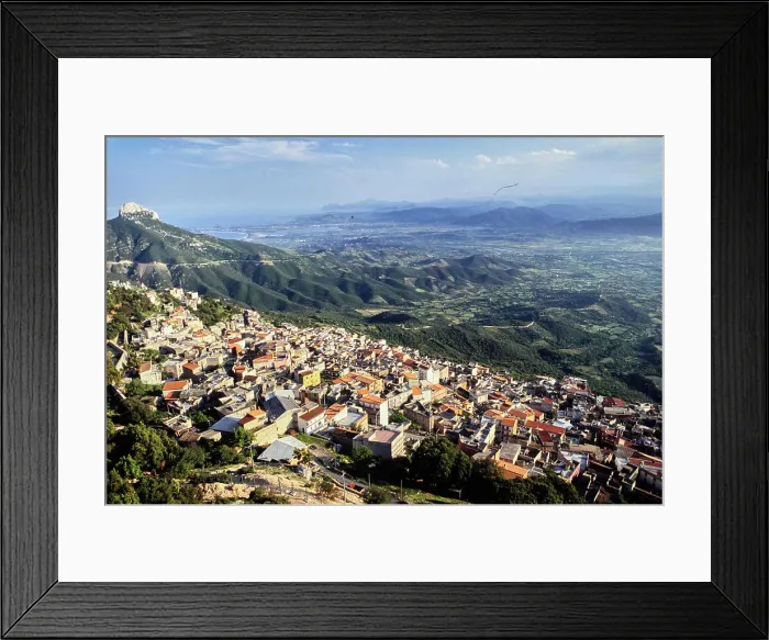 Framed Print : Vintage Photograph. Scenic aerial view of a picturesque town nestled in lush green mountains Framed Print : Vintage Photograph. Scenic aerial view of a picturesque town nestled in lush green mountains