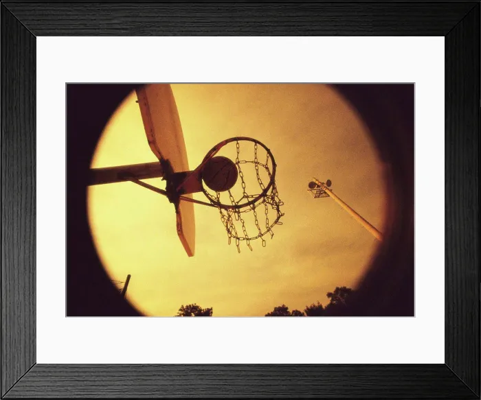 Framed Print : Basketball falling through a hoop Framed Print : Basketball falling through a hoop