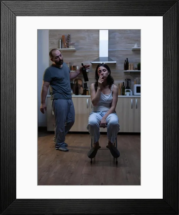 Framed Print : Depressed wife dealing with physical trauma and domestic violence