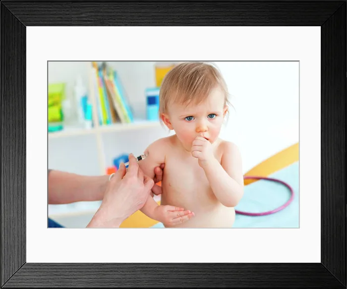 Framed Print : 14 months old baby receiving vaccination Framed Print : 14 months old baby receiving vaccination