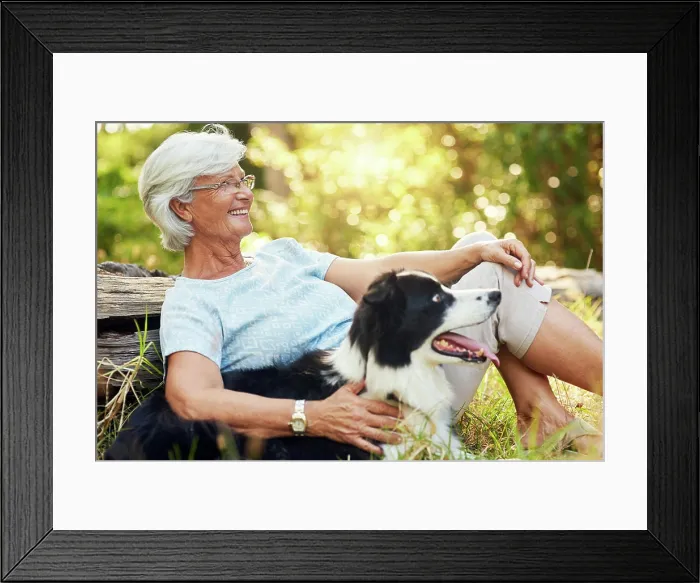 Framed Print : Senior woman, dog and hug in forest to relax for smile Framed Print : Senior woman, dog and hug in forest to relax for smile
