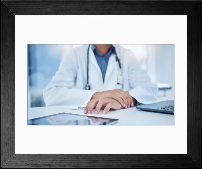 Framed Print : Hands, tablet and healthcare with a doctor at a desk in the hospital for medicine Framed Print : Hands, tablet and healthcare with a doctor at a desk in the hospital for medicine