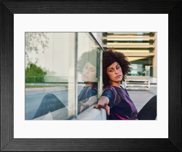 Framed Print : Woman sitting on the street