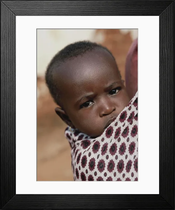 Framed Print : Africa, East Africa, Tanzania. Rural western Tanzania. Baby boy