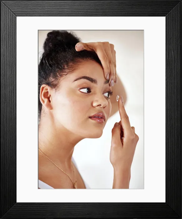 Framed Print : Vision, girl and contact lens in bathroom in home for health Framed Print : Vision, girl and contact lens in bathroom in home for health