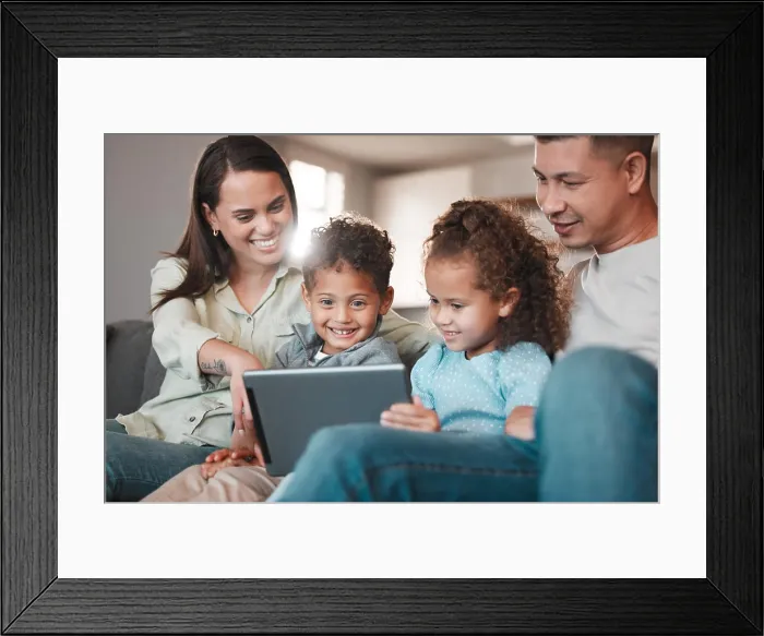 Framed Print : Parents, happy kids and tablet for movies in home Framed Print : Parents, happy kids and tablet for movies in home