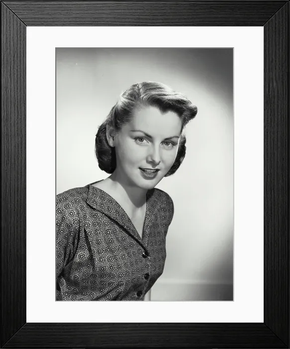 Framed Print : Vintage photograph. Portrait of young woman turned slightly to side Framed Print : Vintage photograph. Portrait of young woman turned slightly to side