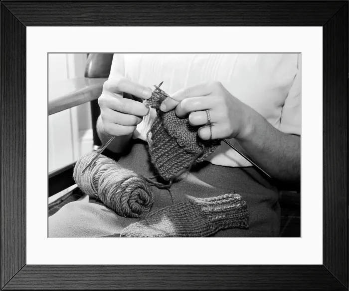 Framed Print : Mid section of woman knitting Framed Print : Mid section of woman knitting
