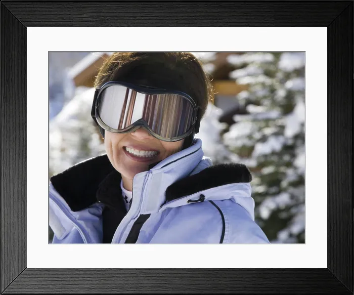 Framed Print : Woman with ski goggles outdoors in winter Framed Print : Woman with ski goggles outdoors in winter