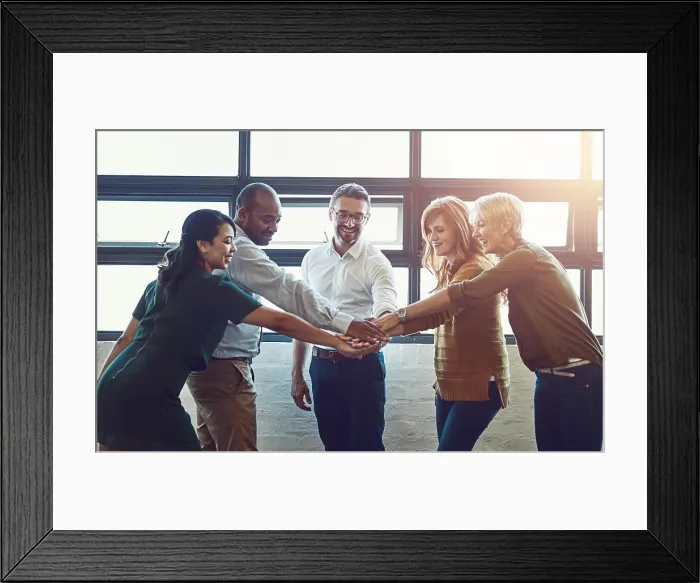 Framed Print : Business people, team and hands with huddle in office for collaboration with synergy Framed Print : Business people, team and hands with huddle in office for collaboration with synergy
