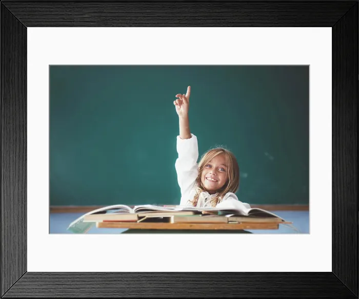 Framed Print : Happy schoolgirl with hand up