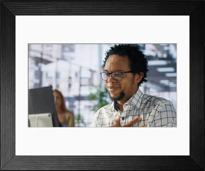Framed Print : African american entrepreneur attends online meeting to discuss business opportunities and resource allocation