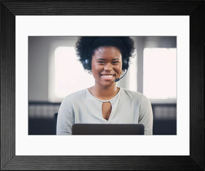 Framed Print : Call center, portrait or happy black woman typing in office building startup agency with smile or support Framed Print : Call center, portrait or happy black woman typing in office building startup agency with smile or support