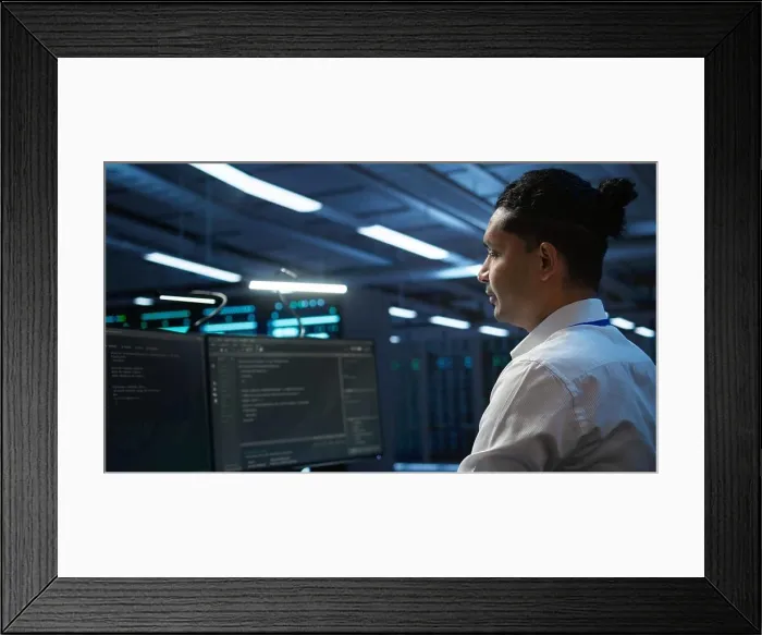 Framed Print : Data center system administrator responsible for installation of networking equipment solving tasks Framed Print : Data center system administrator responsible for installation of networking equipment solving tasks