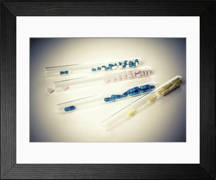 Framed Print : Capsules and pills in test tubes Framed Print : Capsules and pills in test tubes