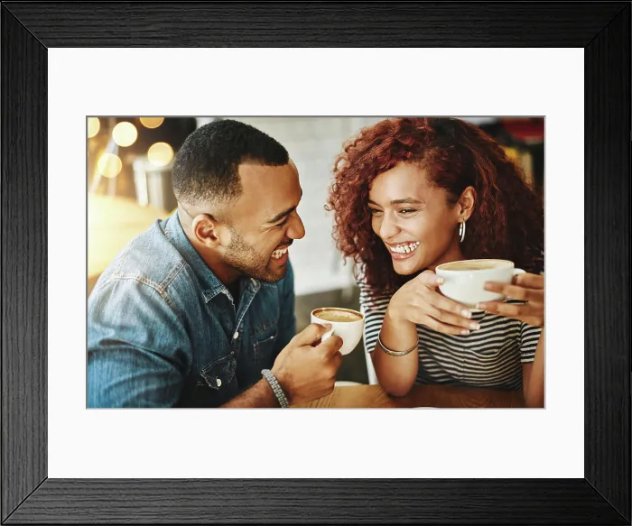 Framed Print : Coffee, conversation and couple laughing on date in cafe for morning catch up together with bonding Framed Print : Coffee, conversation and couple laughing on date in cafe for morning catch up together with bonding