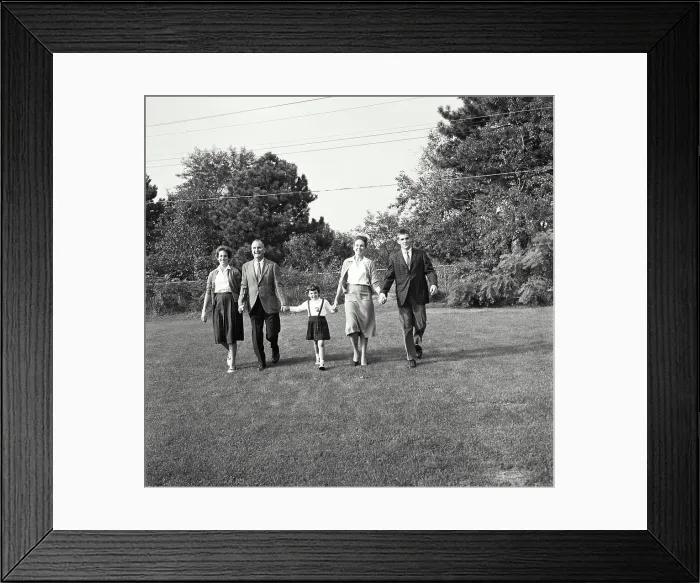 Framed Print : Vintage Photograph. Family walking together in backyard Framed Print : Vintage Photograph. Family walking together in backyard