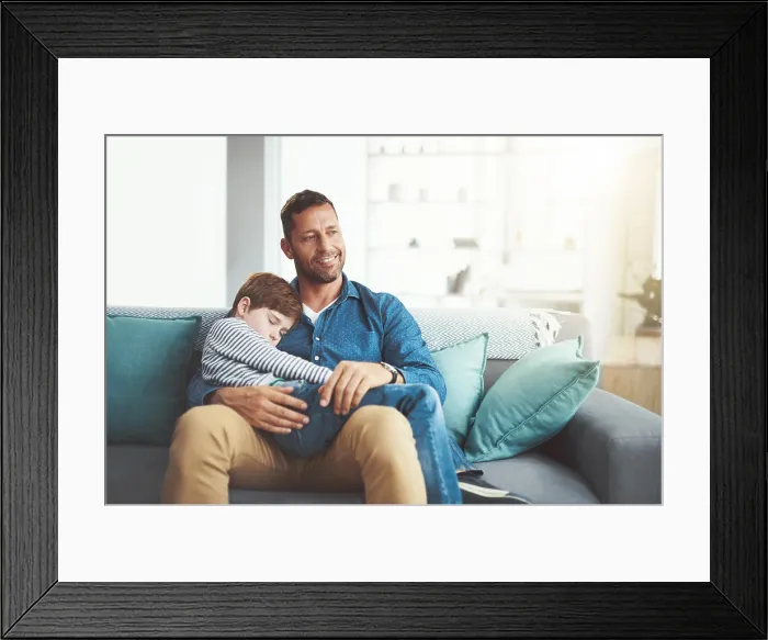 Framed Print : Son, man thinking and sleeping hug in home Framed Print : Son, man thinking and sleeping hug in home