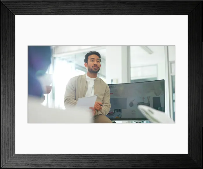 Framed Print : Businessman, leadership or teaching in workshop for training or coaching feedback on paperwork Framed Print : Businessman, leadership or teaching in workshop for training or coaching feedback on paperwork