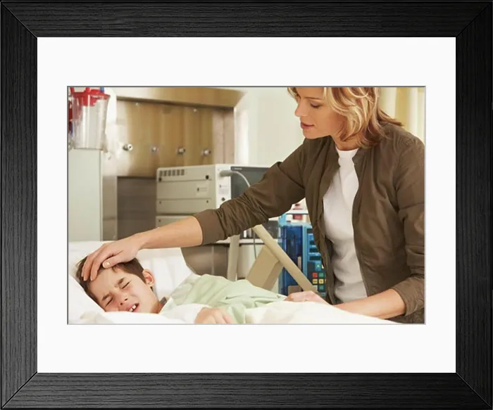 Framed Print : Mother with Sick Child in Hospital Framed Print : Mother with Sick Child in Hospital