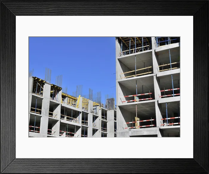 Framed Print : Construction of a monolithic residential building