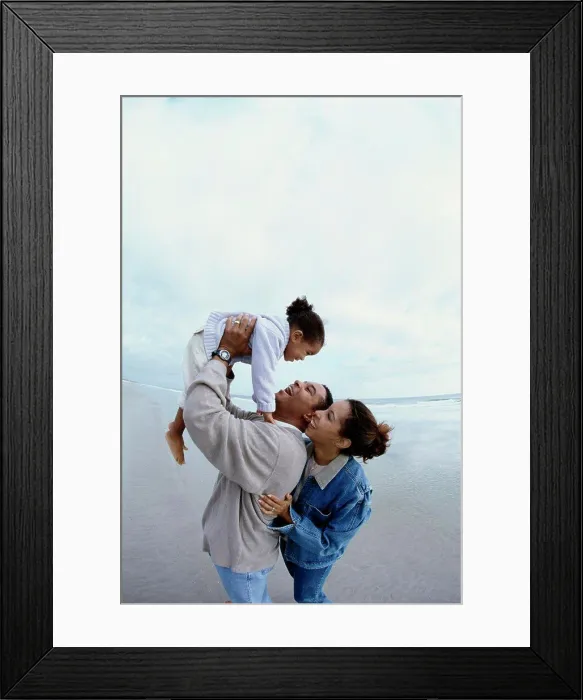 Framed Print : Parents with their daughter on the beach Framed Print : Parents with their daughter on the beach