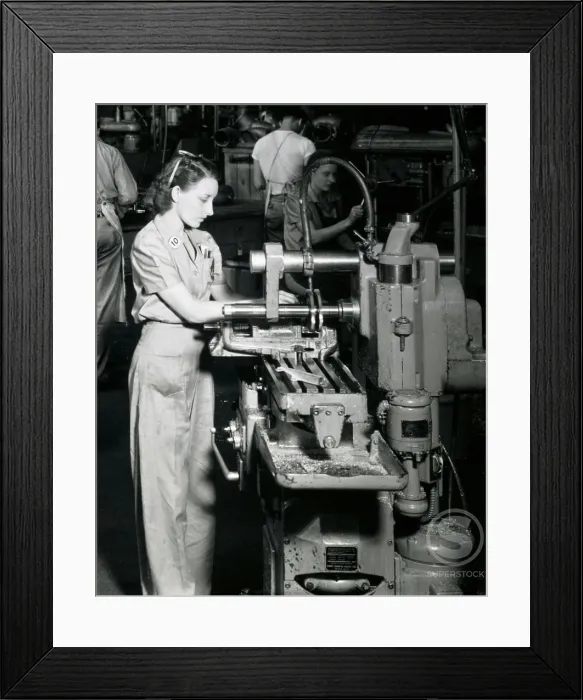 Framed Print : Side profile of a female worker working on a machine in an assembly plant, Vultee Aircraft, 1941 Framed Print : Side profile of a female worker working on a machine in an assembly plant, Vultee Aircraft, 1941