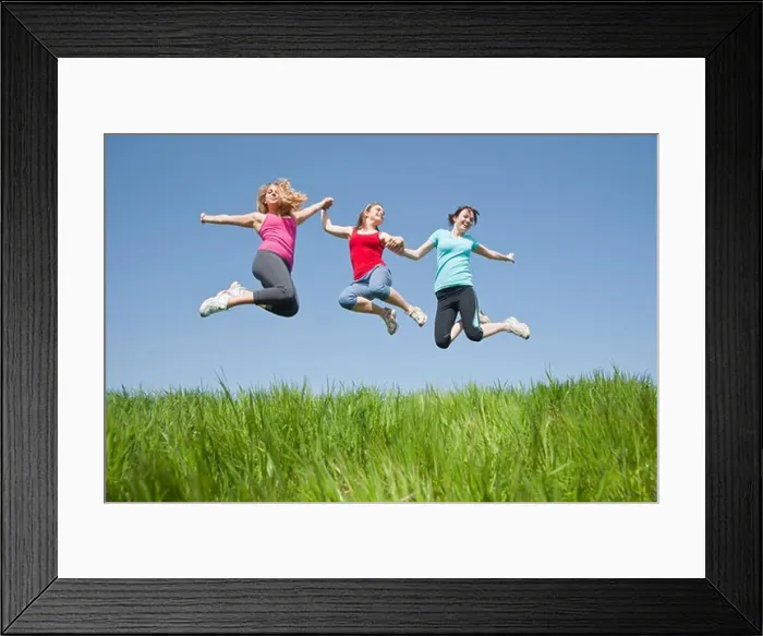 Framed Print : Young Women Jumping