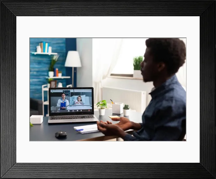 Framed Print : Online video call on laptop with doctor from hospital ward Framed Print : Online video call on laptop with doctor from hospital ward